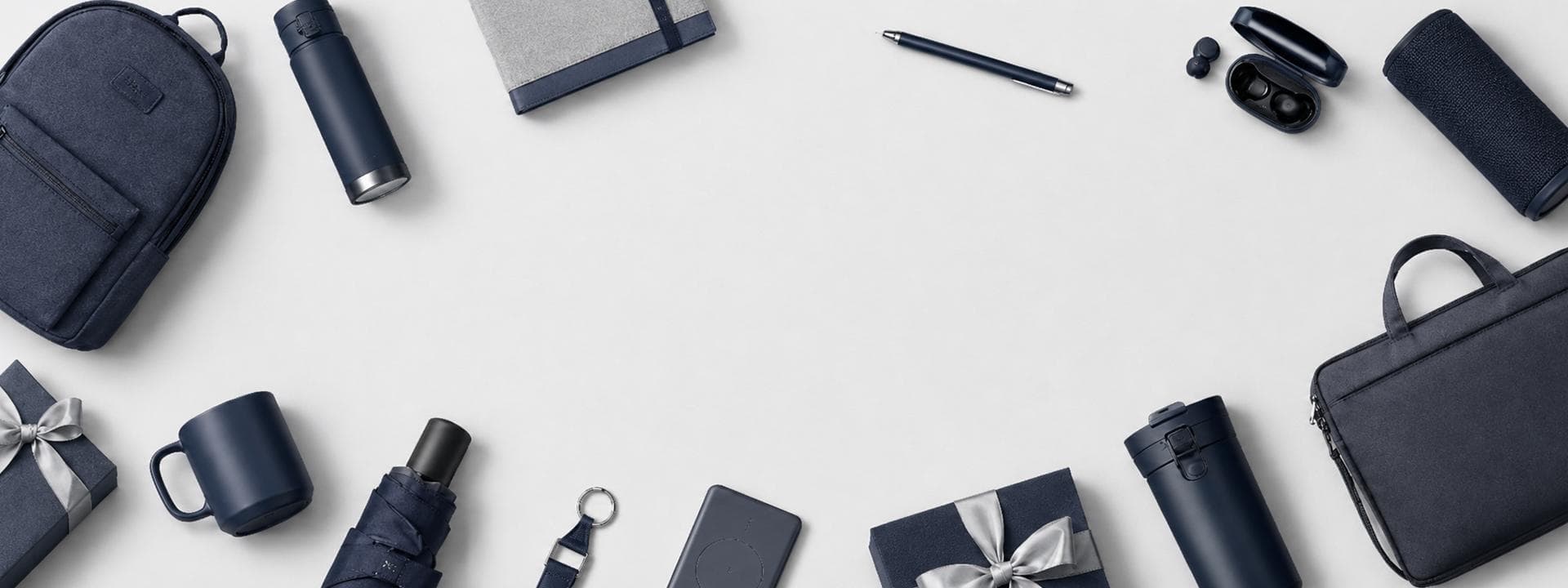 Corporate gift items arranged around a clean workspace for a Singapore gifting guide
